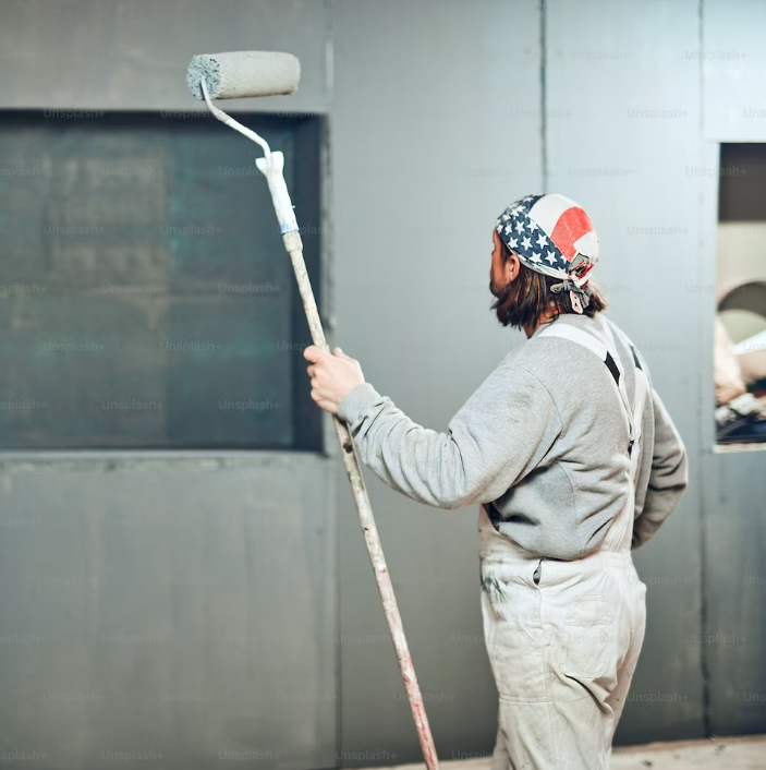 Vanilla Painters, man painting a Commercial Building in Ottawa, Ontario, Canada